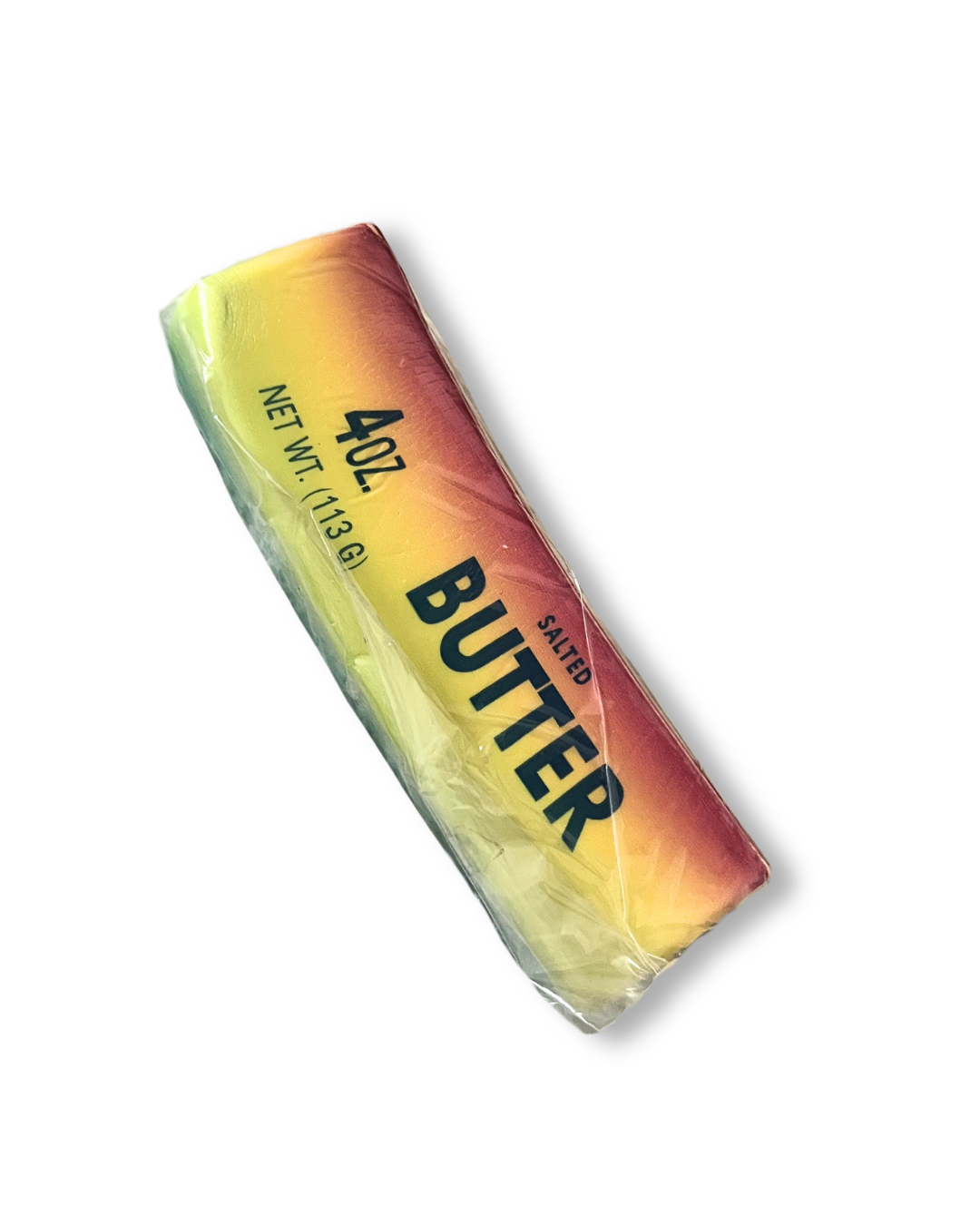 „Podłużny, piankowy gniotek Butter Squishy o długości około 13,5 cm. Kolory tworzą gradient ułożony pionowo wzdłuż produktu.”
